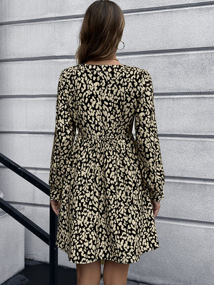 Ivy Lane Animal Print Buttoned V-Neck Long Sleeve Dress